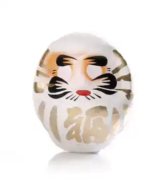 Weißer Daruma 9 cm – Klarheit & Fokus Weißer Daruma mit goldenen Details auf hellem Hintergrund